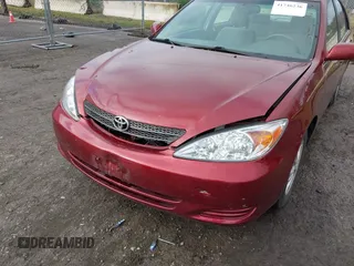2004 Toyota Camry LE with VIN 4T1BF32K74U069737, listed as a IAAI auction lot 41746236 with 48,026 mi miles. Bid and sale history available at carsss.com. Image 6.