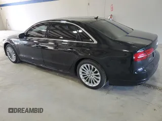 2016 Audi A8 Sport z VIN WAU43AFD1GN011589, wystawiony jako Copart lot #86614934 z przebiegiem 96 137 mil mil oraz Szkoda całkowita • Salvage title. Historia ofert i sprzedaży dostępna na DreamBid. Obrazek 2.