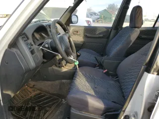 1998 Toyota RAV4 with VIN JT3GP10V9W7029884, listed as a Copart auction lot 87432264 with 190,451 mi miles and Clean title. Bid and sale history available at DreamBid. Image 7.