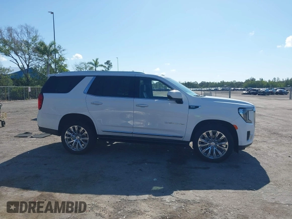 2023 GMC Yukon Denali with VIN 1GKS1DKL2PR303909, listed as a IAAI auction lot 42018679 with 65,532 mi miles. Bid and sale history available at carsss.com. Image 13.