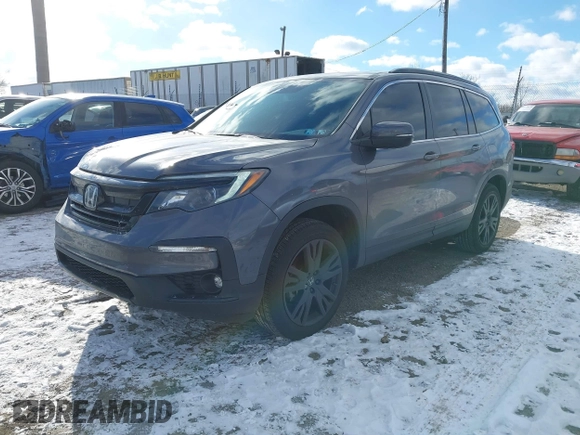 2022 Honda Pilot Special Edition with VIN 5FNYF6H20NB063506, listed as a IAAI auction lot 41239636 with 59,752 mi miles. Bid and sale history available at carsss.com. Image 2.
