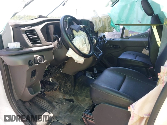 2023 Ford Transit Cargo with VIN 1FTBR1C82PKA26720, listed as a IAAI auction lot 39437379 with Not provided miles and . Bid and sale history available at DreamBid. Image 5.