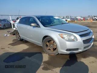 2011 Chevrolet Malibu 1LS with VIN 1G1ZB5E15BF182349, listed as a IAAI auction lot 41456341 with 150,207 mi miles and . Bid and sale history available at DreamBid. Image 1.
