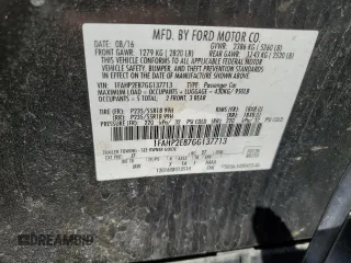 2016 Ford Taurus SEL with VIN 1FAHP2E87GG137713, listed as a Copart auction lot 52519035 with 134,227 mi miles and Salvage Title. Bid and sale history available at DreamBid. Image 13.