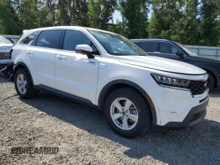2023 Kia Sorento LX with VIN 5XYRG4LC5PG164459, listed as a Copart auction lot 57391905 with 58,452 mi miles and Salvage title. Bid and sale history available at DreamBid. Image 4.