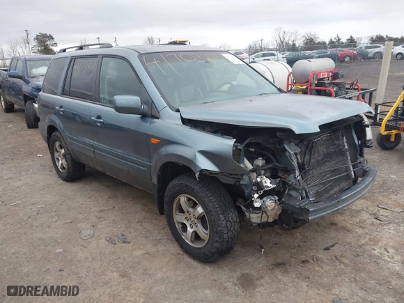 2006 Honda Pilot EX-L with RES with VIN 2HKYF18646H555514, listed as a IAAI auction lot 41703223 with 292,487 mi miles. Bid and sale history available at carsss.com. Image 1.