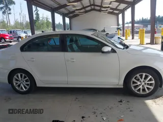 2013 Volkswagen Jetta SE with VIN 3VWDP7AJ3DM450335, listed as a IAAI auction lot 42575198 with 100,184 mi miles and . Bid and sale history available at DreamBid. Image 13.