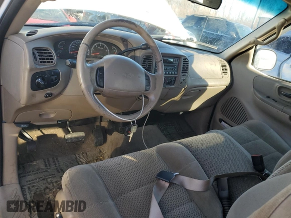 2002 Ford F-150 XL with VIN 1FTRX17L52NA26169, listed as a Copart auction lot 88756715 with 114,841 mi miles and Salvage title. Bid and sale history available at DreamBid. Image 8.