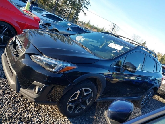2019 Subaru Crosstrek Limited with VIN JF2GTANC5K8293687, listed as a IAAI auction lot 41287542 with 87,759 mi miles. Bid and sale history available at carsss.com. Image 14.