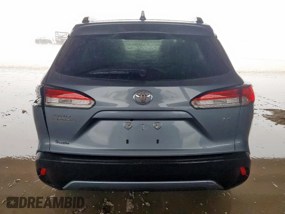 2023 Toyota Corolla Cross LE with VIN 7MUBAAAG4PV042580, listed as a Copart auction lot 63797305 with 59,576 mi miles and Salvage title. Bid and sale history available at DreamBid. Image 6.