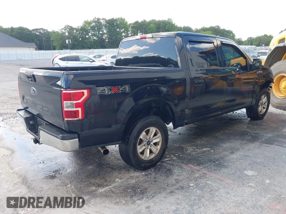 2019 Ford F-150 XL with VIN 1FTEW1E56KFA63764, listed as a IAAI auction lot 42410872 with 124,648 mi miles and . Bid and sale history available at DreamBid. Image 4.