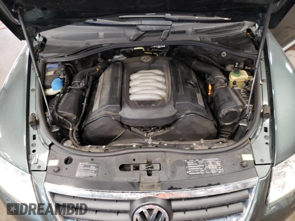 2004 Volkswagen Touareg z VIN WVGCM67L94D032492, wystawiony jako Copart lot #72205044 z przebiegiem 98 482 mil mil oraz Czysty tytuł • Clean title. Historia ofert i sprzedaży dostępna na DreamBid. Obrazek 12.