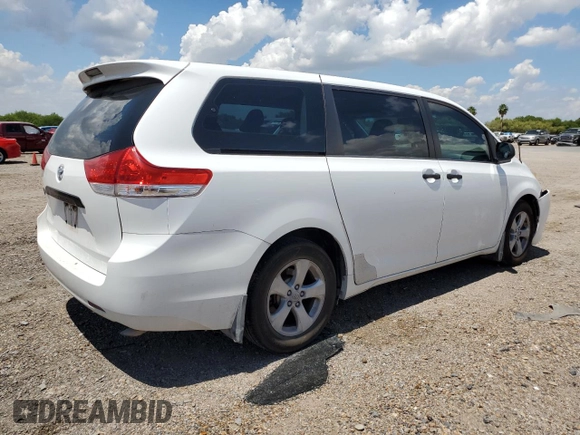 2014 Toyota Sienna L with VIN 5TDZK3DCXES463632, listed as a Copart auction lot 69957284 with 206,250 mi miles and Salvage Title. Bid and sale history available at carsss.com. Image 3.