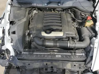2014 Porsche Cayenne z VIN WP1AA2A2XELA95345, wystawiony jako Copart lot #55649365 z przebiegiem 116 325 mil mil oraz Szkoda całkowita • Salvage title. Historia ofert i sprzedaży dostępna na DreamBid. Obrazek 12.