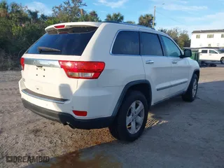 2011 Jeep Grand Cherokee Limited with VIN 1J4RR5GG0BC668910, listed as a IAAI auction lot 41353138 with 74,388 mi miles. Bid and sale history available at carsss.com. Image 4.