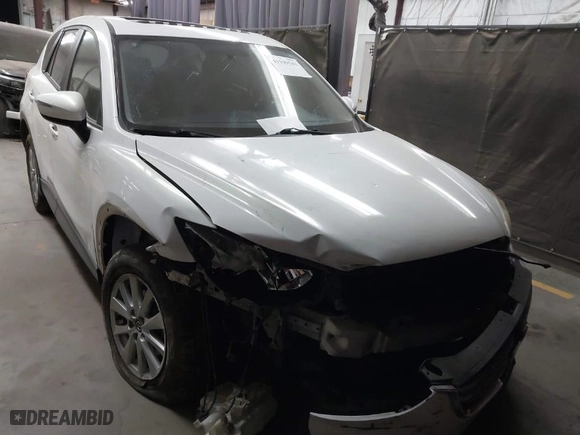 2016 Mazda CX-5 Touring with VIN JM3KE2CY8G0727637, listed as a IAAI auction lot 41190541 with NaN miles. Bid and sale history available at carsss.com. Image 1.