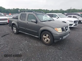 2005 Nissan Frontier LE with VIN 1N6AD07W45C456623, listed as a IAAI auction lot 42650801 with 286,643 mi miles and . Bid and sale history available at DreamBid. Image 1.