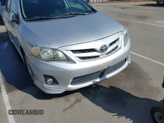 2012 Toyota Corolla L with VIN 2T1BU4EEXCC866050, listed as a IAAI auction lot 42140147 with 212,814 mi miles. Bid and sale history available at carsss.com. Image 6.