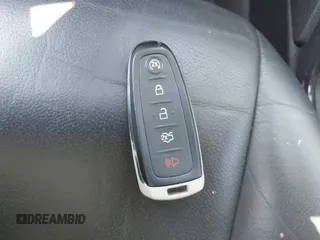 2015 Ford Escape Titanium with VIN 1FMCU9J96FUB58519, listed as a IAAI auction lot 42429369 with 125,541 mi miles and . Bid and sale history available at DreamBid. Image 11.