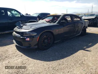2022 Dodge Charger Scat Pack with VIN 2C3CDXGJ6NH180939, listed as a Copart auction lot 61694304 with Not Provided miles and Salvage Title. Bid and sale history available at carsss.com. Image 1.