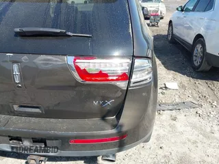 2011 Lincoln MKX with VIN 2LMDJ6JK1BBJ11840, listed as a IAAI auction lot 41769107 with 202,313 mi miles. Bid and sale history available at carsss.com. Image 6.