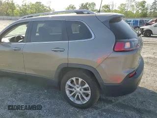 2019 Jeep Cherokee Latitude with VIN 1C4PJLCX8KD110683, listed as a Copart auction lot 51902075 with 115,791 mi miles and Salvage title. Bid and sale history available at DreamBid. Image 12.