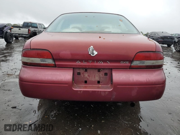1996 Nissan Altima XE z VIN 1N4BU31D1TC118891, wystawiony jako Copart lot #73860614 z przebiegiem 158 039 mil mil oraz Szkoda całkowita • Salvage title. Historia ofert i sprzedaży dostępna na DreamBid. Obrazek 6.