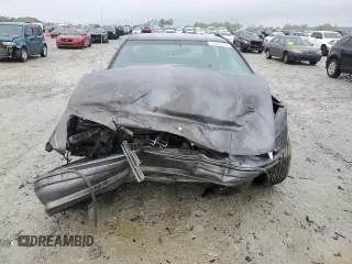 1991 Chevrolet Caprice z VIN 1G1BN53E1MW223013, wystawiony jako Copart lot #49857604 z przebiegiem 224 278 mil mil oraz Szkoda całkowita • Salvage title. Historia ofert i sprzedaży dostępna na DreamBid. Obrazek 5.
