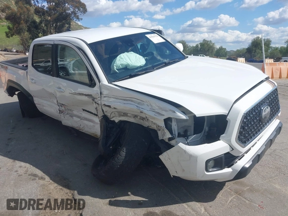 2019 Toyota Tacoma SR z VIN 3TMCZ5AN5KM249582, wystawiony jako IAAI lot #41925752 z przebiegiem 108 417 mil mil oraz . Historia ofert i sprzedaży dostępna na DreamBid. Obrazek 1.
