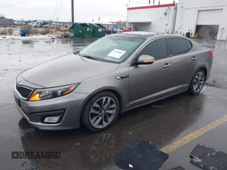 2015 Kia Optima SX Turbo with VIN 5XXGR4A66FG361755, listed as a IAAI auction lot 41199887 with 114,179 mi miles. Bid and sale history available at carsss.com. Image 17.