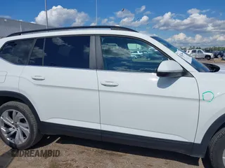 2021 Volkswagen Atlas SE z VIN 1V2WR2CA9MC585700, wystawiony jako IAAI lot #42234502 z przebiegiem 46 040 mil mil oraz . Historia ofert i sprzedaży dostępna na DreamBid. Obrazek 13.