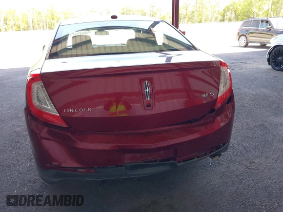 2014 Lincoln MKS z VIN 1LNHL9DK0EG606497, wystawiony jako IAAI lot #42279603 z przebiegiem 129 972 mil mil oraz . Historia ofert i sprzedaży dostępna na DreamBid. Obrazek 6.
