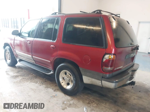 2000 Ford Explorer XLT z VIN 1FMZU83P1YZC54998, wystawiony jako IAAI lot #41613856 z przebiegiem 225 855 mil mil oraz . Historia ofert i sprzedaży dostępna na DreamBid. Obrazek 3.