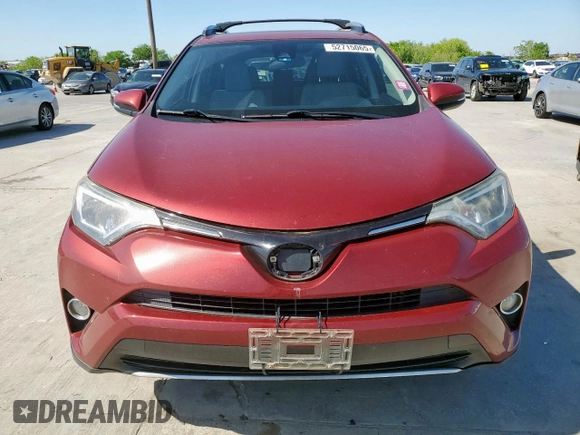 2018 Toyota RAV4 XLE with VIN JTMRFREV4JD234778, listed as a Copart auction lot 52715065 with 131,407 mi miles and Salvage Title. Bid and sale history available at carsss.com. Image 5.