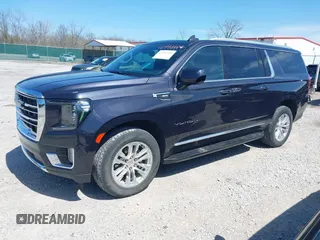 2023 GMC Yukon XL SLT z VIN 1GKS2GKD1PR137714, wystawiony jako IAAI lot #41982459 z przebiegiem 63 887 mil mil oraz . Historia ofert i sprzedaży dostępna na DreamBid. Obrazek 2.