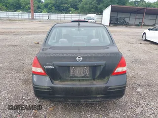 2009 Nissan Versa 1.6 z VIN 3N1CC11E29L453804, wystawiony jako IAAI lot #42447783 z przebiegiem 62 781 mil mil oraz . Historia ofert i sprzedaży dostępna na DreamBid. Obrazek 15.
