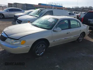 2002 Lincoln Continental with VIN 1LNHM97V02Y600322, listed as a IAAI auction lot 41714349 with 226,142 mi miles and . Bid and sale history available at DreamBid. Image 2.