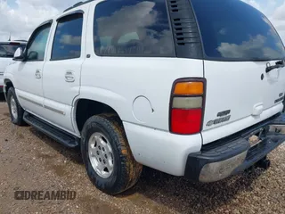 2004 Chevrolet Tahoe LT with VIN 1GNEC13ZX4R127036, listed as a IAAI auction lot 42484115 with 290,351 mi miles and . Bid and sale history available at DreamBid. Image 3.