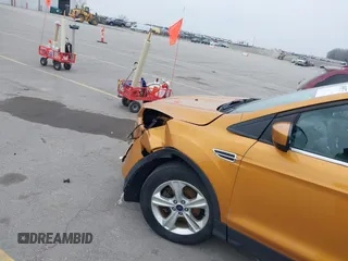 2016 Ford Escape SE z VIN 1FMCU9GX1GUC59233, wystawiony jako IAAI lot #41958573 z przebiegiem 133 223 mil mil oraz . Historia ofert i sprzedaży dostępna na DreamBid. Obrazek 22.