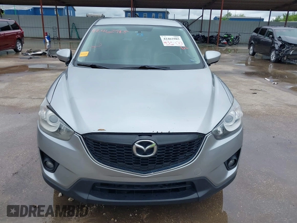 2014 Mazda CX-5 Touring z VIN JM3KE2CY8E0369145, wystawiony jako IAAI lot #42462985 z przebiegiem 155 480 mil mil oraz . Historia ofert i sprzedaży dostępna na DreamBid. Obrazek 12.