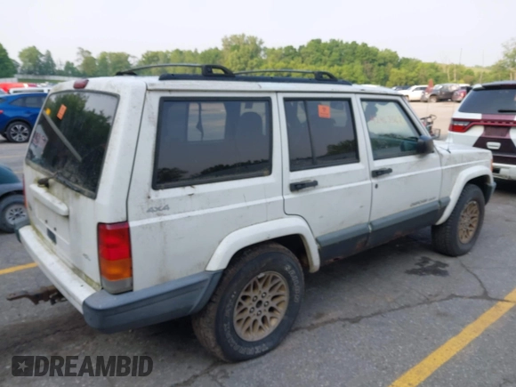 1999 Jeep Cherokee Sport z VIN 1J4FF68S0XL663735, wystawiony jako IAAI lot #42463562 z przebiegiem Nie podano mil oraz . Historia ofert i sprzedaży dostępna na DreamBid. Obrazek 4.