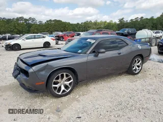 2015 Dodge Challenger SXT Plus with VIN 2C3CDZBG2FH701129, listed as a Copart auction lot 57080405 with 271,727 mi miles and Salvage title. Bid and sale history available at DreamBid. Image 1.