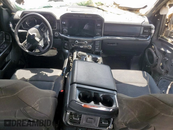2021 Ford F-150 XL z VIN 1FTFW1E50MFB77606, wystawiony jako Copart lot #58651495 z przebiegiem 83 247 mil mil oraz Szkoda całkowita • Salvage title. Historia ofert i sprzedaży dostępna na DreamBid. Obrazek 8.