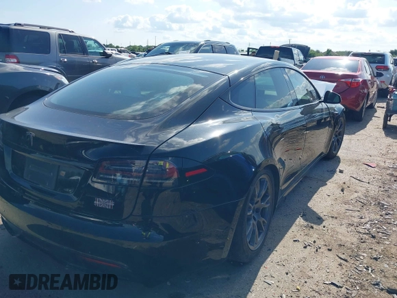 2022 Tesla Model S Plaid with VIN 5YJSA1E63NF478351, listed as a IAAI auction lot 42056199 with Not provided miles and . Bid and sale history available at DreamBid. Image 4.