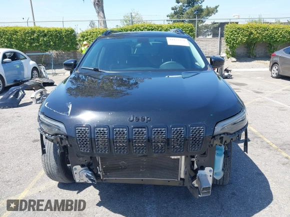 2020 Jeep Cherokee Latitude Plus with VIN 1C4PJMLB8LD563861, listed as a IAAI auction lot 41973359 with 62,234 mi miles and . Bid and sale history available at DreamBid. Image 13.