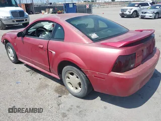 2000 Ford Mustang with VIN 1FAFP4047YF304313, listed as a IAAI auction lot 42397594 with 139,016 mi miles and . Bid and sale history available at DreamBid. Image 3.