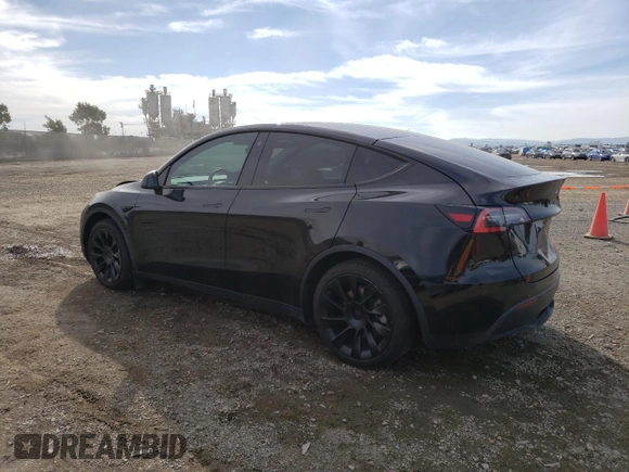 2021 Tesla Model Y Long Range with VIN 5YJYGAEE9MF137910, listed as a Copart auction lot 81921303 with 47,397 mi miles and Salvage Title. Bid and sale history available at DreamBid. Image 2.
