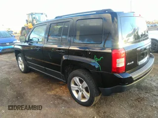 2014 Jeep Patriot Latitude with VIN 1C4NJRFB0ED799097, listed as a IAAI auction lot 40834502 with 192,940 mi miles. Bid and sale history available at carsss.com. Image 3.