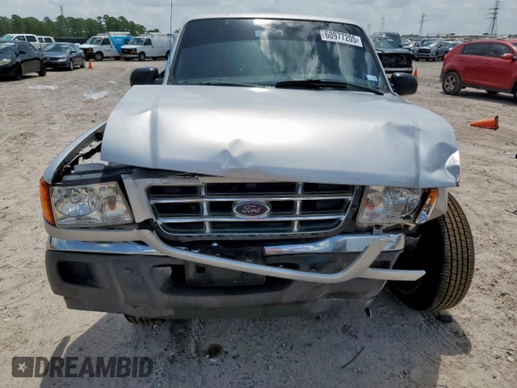 2001 Ford Ranger XL with VIN 1FTYR14V01PB46542, listed as a Copart auction lot 60977205 with 230,933 mi miles and Salvage title. Bid and sale history available at DreamBid. Image 5.