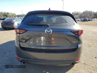 2021 Mazda CX-5 Grand Touring with VIN JM3KFBDM1M0489859, listed as a Copart auction lot 48688905 with 36,882 mi miles and Salvage Title. Bid and sale history available at DreamBid. Image 6.